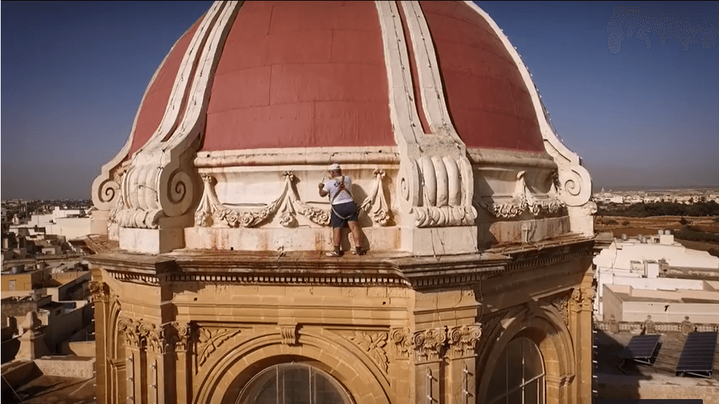 Volunteer on Church Dome before festa